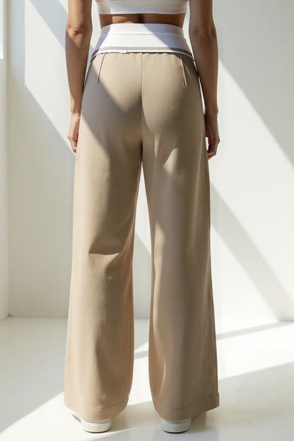 Pantaloni larghi con dettaglio in vita effetto camicia | Vita bassa | Stile urban chic