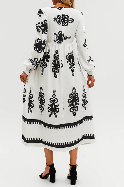 Vestito midi con stampa geometrica | Scollo a portafoglio e maniche lunghe